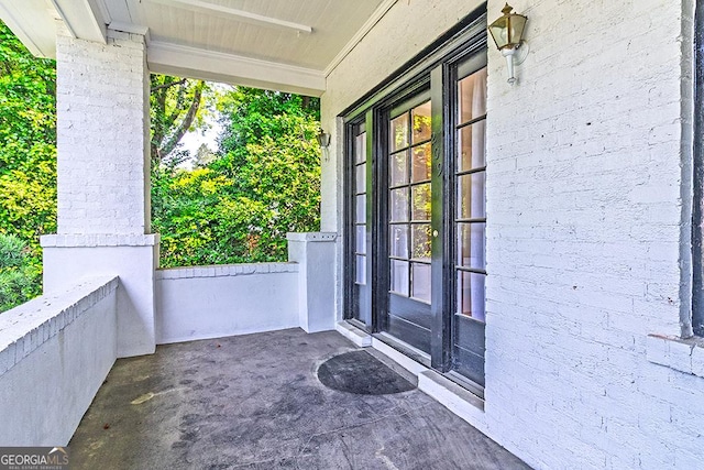 209 Forest Hill Rd, Macon, GA 31210 - property entrance with covered porch and french doors