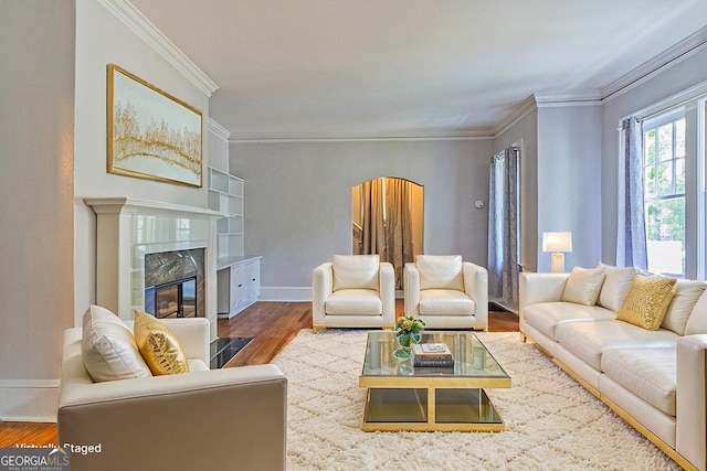 209 Forest Hill Rd, Macon, GA 31210 - living room featuring wood finished floors, a high end fireplace, and crown molding