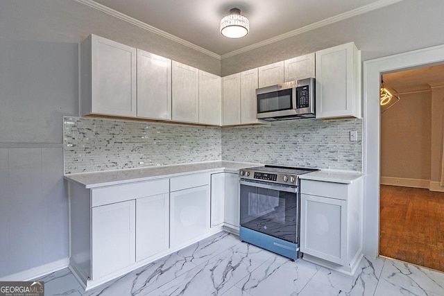 209 Forest Hill Rd, Macon, GA 31210 - kitchen with appliances with stainless steel finishes, light marble finish floors, light countertops, crown molding, and backsplash