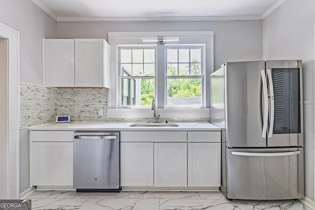 209 Forest Hill Rd, Macon, GA 31210 - kitchen featuring appliances with stainless steel finishes, light marble finish flooring, light countertops, and crown molding