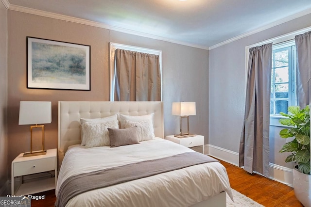 209 Forest Hill Rd, Macon, GA 31210 - bedroom with ornamental molding and wood finished floors