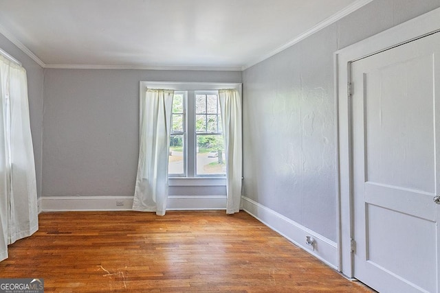 209 Forest Hill Rd, Macon, GA 31210 - spare room featuring ornamental molding and wood finished floors