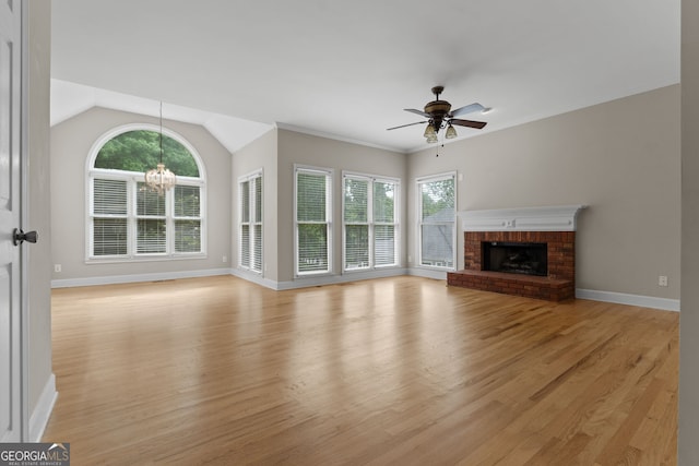 3642 Fowler Rdg, Douglasville, GA 30135 - unfurnished living room with a ceiling fan, healthy amount of natural light, light wood-type flooring, baseboards, and lofted ceiling
