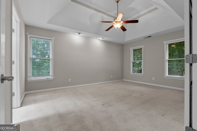 3642 Fowler Rdg, Douglasville, GA 30135 - unfurnished room with a tray ceiling, carpet, ceiling fan, and baseboards