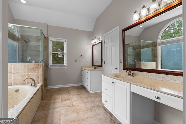 3642 Fowler Rdg, Douglasville, GA 30135 - full bath with a shower stall, two vanities, lofted ceiling, a bath, and baseboards