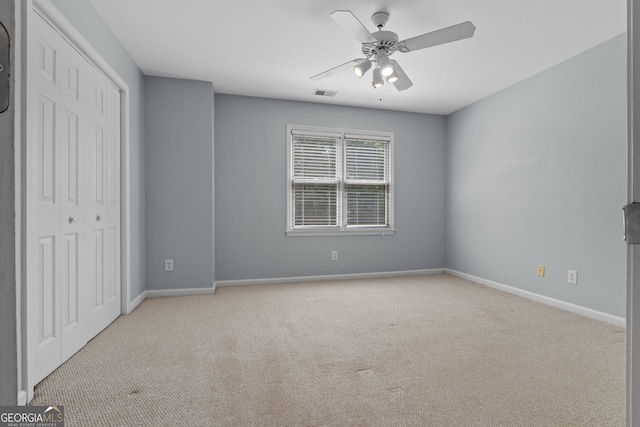 3642 Fowler Rdg, Douglasville, GA 30135 - unfurnished bedroom featuring carpet floors, a closet, baseboards, and ceiling fan