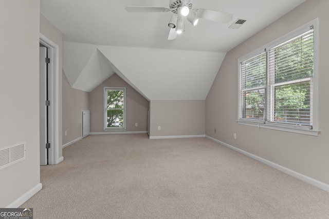 3642 Fowler Rdg, Douglasville, GA 30135 - bonus room featuring light colored carpet, healthy amount of natural light, baseboards, a ceiling fan, and vaulted ceiling