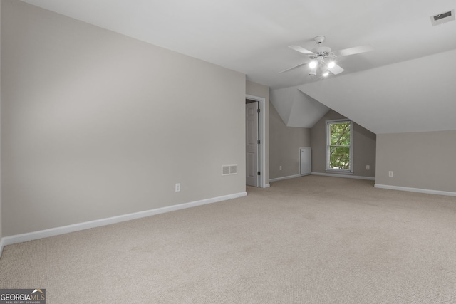 3642 Fowler Rdg, Douglasville, GA 30135 - additional living space featuring ceiling fan, baseboards, light colored carpet, and lofted ceiling