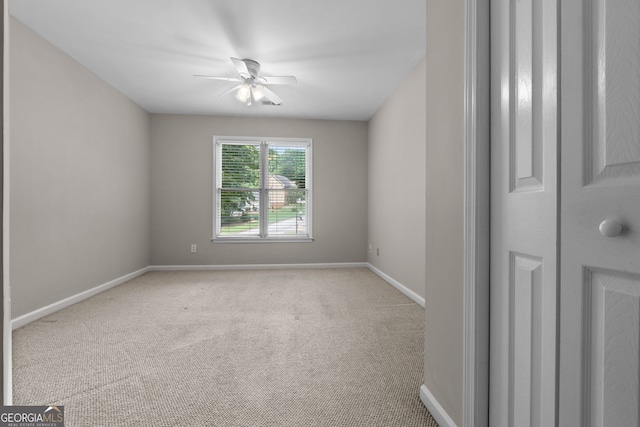 3642 Fowler Rdg, Douglasville, GA 30135 - carpeted spare room featuring baseboards and ceiling fan