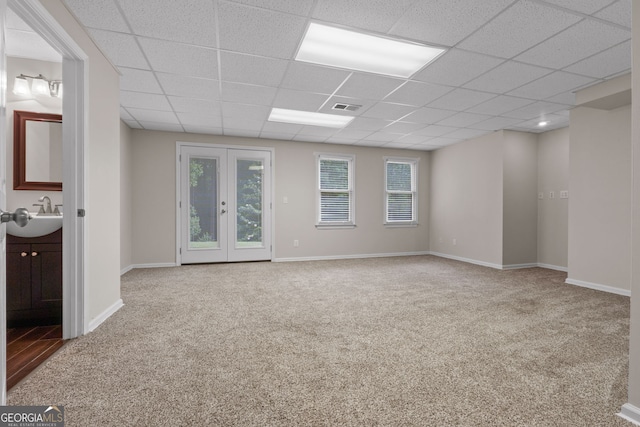 3642 Fowler Rdg, Douglasville, GA 30135 - spare room featuring carpet floors, a sink, a paneled ceiling, and baseboards