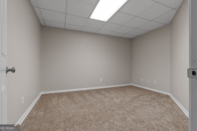 3642 Fowler Rdg, Douglasville, GA 30135 - empty room featuring carpet floors, a paneled ceiling, and baseboards