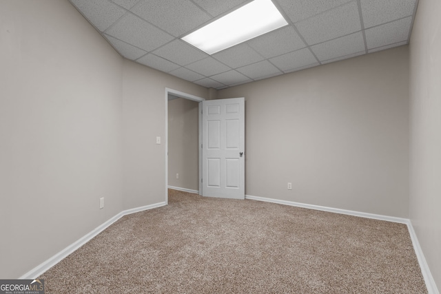 3642 Fowler Rdg, Douglasville, GA 30135 - carpeted spare room with baseboards and a paneled ceiling