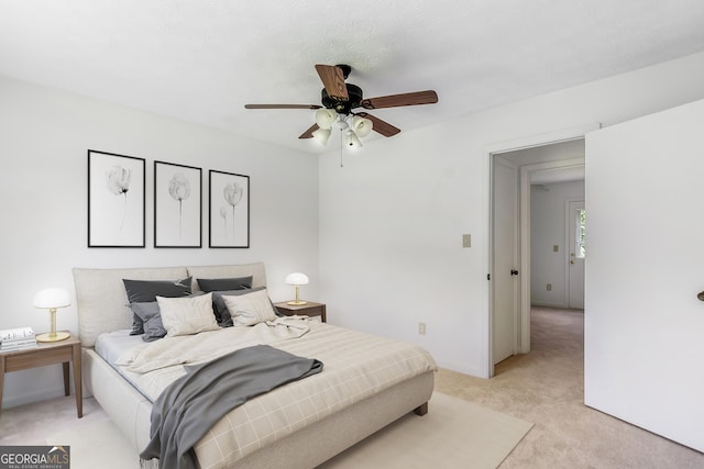 320 Edna Dr, Stockbridge, GA 30281 - bedroom featuring light colored carpet and a ceiling fan