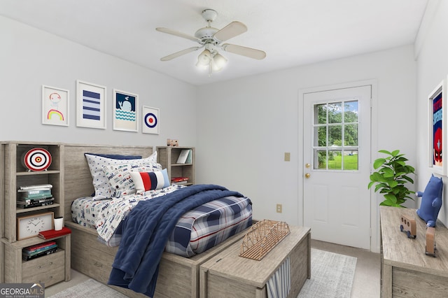 320 Edna Dr, Stockbridge, GA 30281 - carpeted bedroom with a ceiling fan
