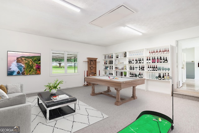 320 Edna Dr, Stockbridge, GA 30281 - recreation room featuring attic access, carpet flooring, and baseboards