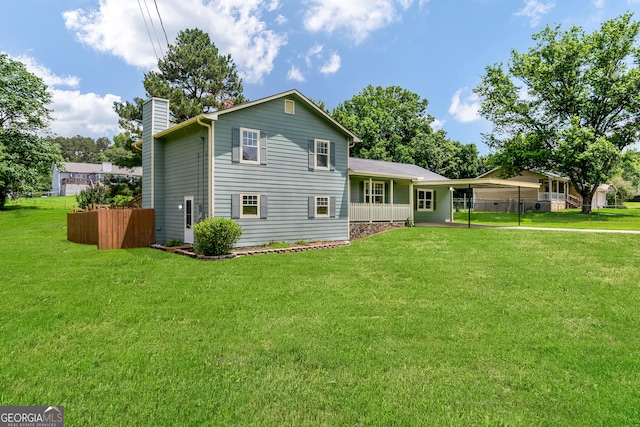 320 Edna Dr, Stockbridge, GA 30281 - rear view of property featuring a chimney