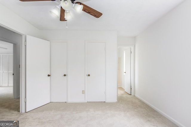 320 Edna Dr, Stockbridge, GA 30281 - unfurnished bedroom featuring light carpet and baseboards