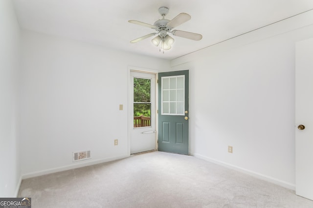 320 Edna Dr, Stockbridge, GA 30281 - spare room featuring carpet, baseboards, and a ceiling fan