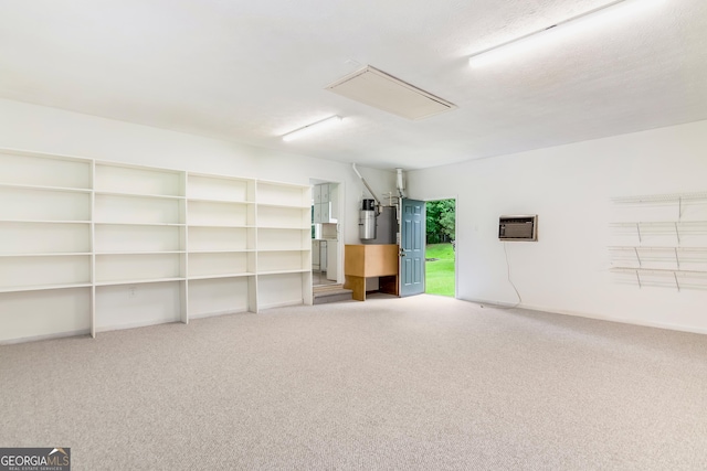 320 Edna Dr, Stockbridge, GA 30281 - garage featuring a central vacuum unit and an AC wall unit