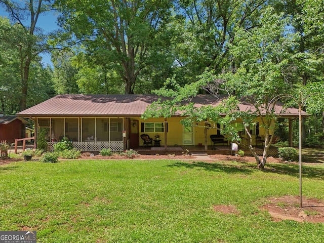 293 Timber Ridge Dr, Athens, GA 30607 - view of front facade with a front lawn, a sunroom, and metal roof