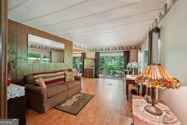 293 Timber Ridge Dr, Athens, GA 30607 - living area with wood finished floors and wooden walls