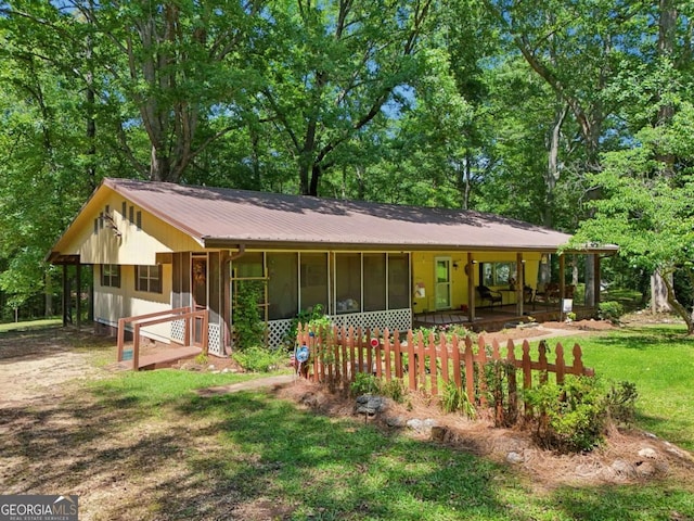 293 Timber Ridge Dr, Athens, GA 30607 - view of front facade with metal roof, a porch, and a front yard