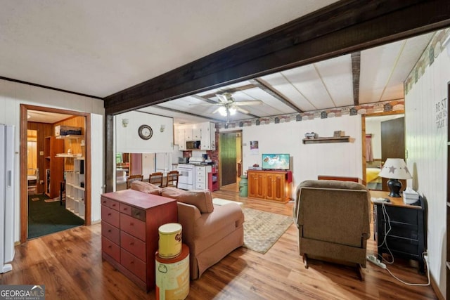 293 Timber Ridge Dr, Athens, GA 30607 - living area with wood finished floors, ceiling fan, and wooden walls