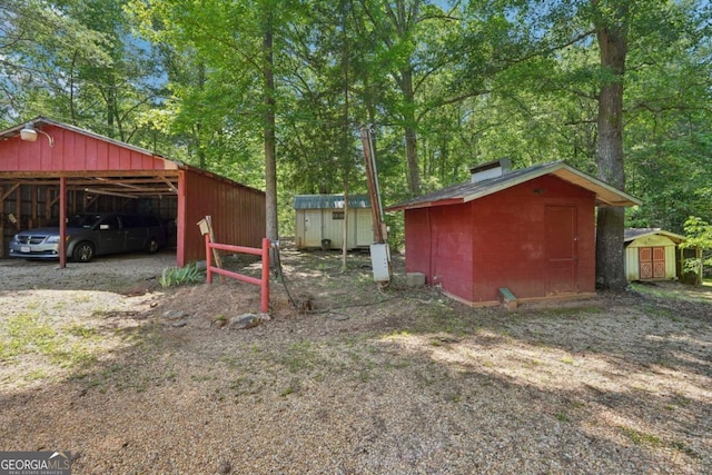293 Timber Ridge Dr, Athens, GA 30607 - view of yard with a carport and view of wooded area
