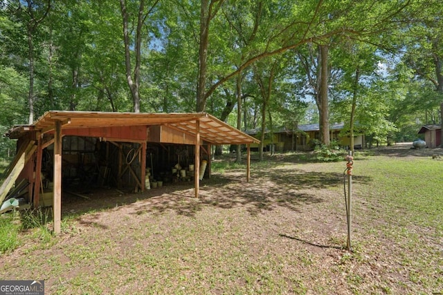 293 Timber Ridge Dr, Athens, GA 30607 - view of yard with an outdoor structure and a pole building