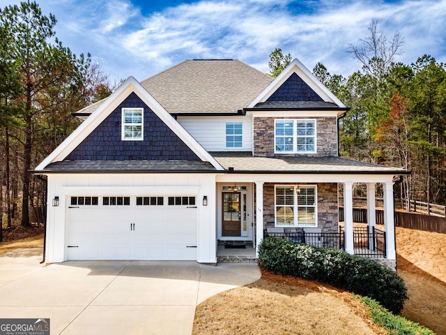 15 Jamilee Cv, Cartersville, GA 30120 - view of front of property featuring a porch, driveway, and stone siding