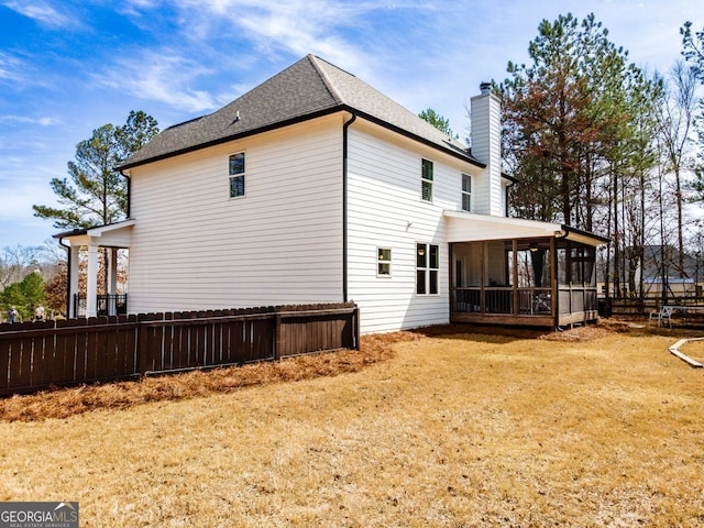 15 Jamilee Cv, Cartersville, GA 30120 - view of property exterior featuring a sunroom, a chimney, and a shingled roof