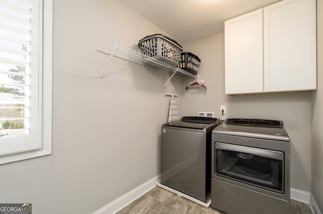 15 Jamilee Cv, Cartersville, GA 30120 - laundry room featuring independent washer and dryer, cabinet space, and baseboards