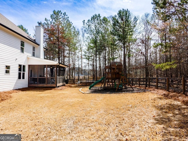 15 Jamilee Cv, Cartersville, GA 30120 - view of yard featuring a playground and a sunroom