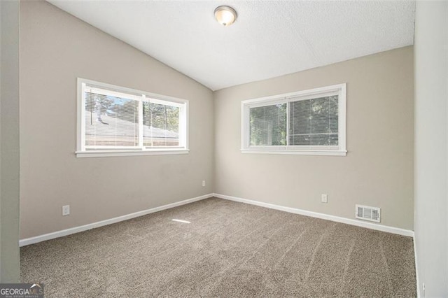2641 Clifton Springs Rd, Decatur, GA 30034 - carpeted spare room featuring lofted ceiling and baseboards