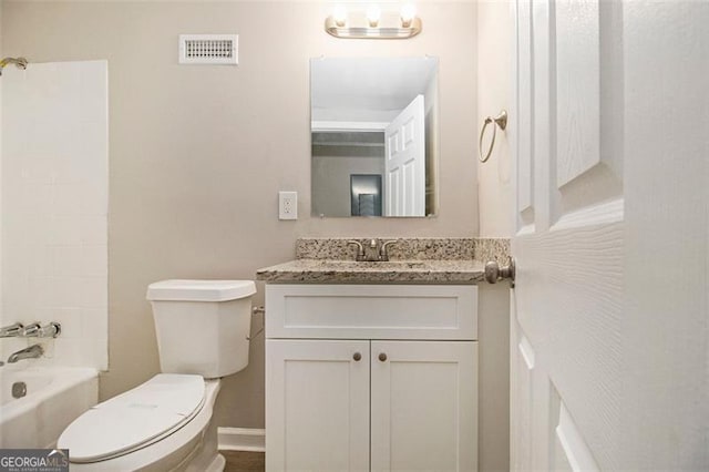 2641 Clifton Springs Rd, Decatur, GA 30034 - bathroom featuring toilet, vanity, and bathing tub / shower combination