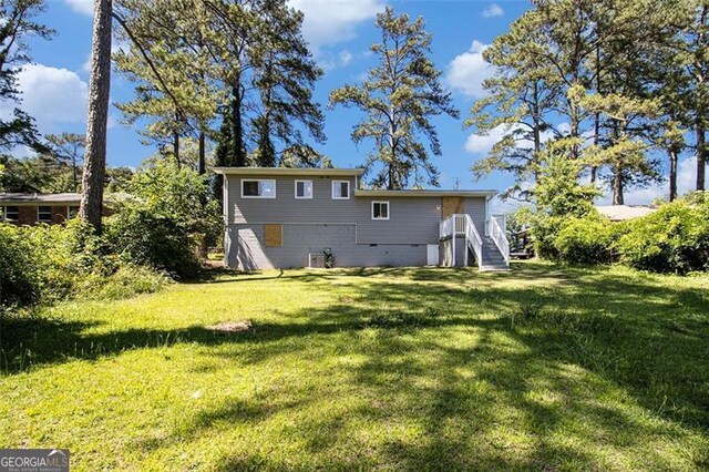 2641 Clifton Springs Rd, Decatur, GA 30034 - back of property featuring a yard