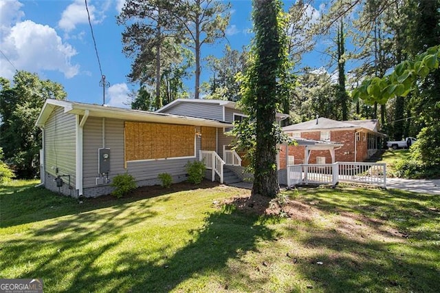 2641 Clifton Springs Rd, Decatur, GA 30034 - view of front facade with a front yard and a deck