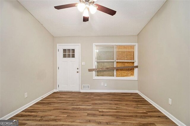 2641 Clifton Springs Rd, Decatur, GA 30034 - unfurnished room with a ceiling fan, baseboards, and wood finished floors