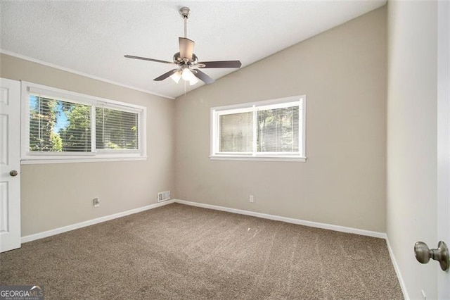 2641 Clifton Springs Rd, Decatur, GA 30034 - unfurnished room featuring carpet, plenty of natural light, ceiling fan, and vaulted ceiling
