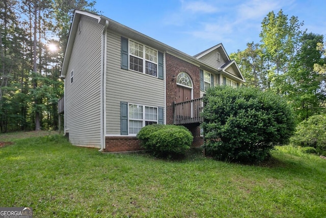 8915 Tweeddale Dr, Winston, GA 30187 - view of front of house featuring a front lawn and brick siding
