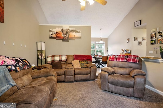 8915 Tweeddale Dr, Winston, GA 30187 - living area with ceiling fan, carpet flooring, high vaulted ceiling, and baseboards