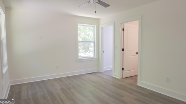 71 Cold Springs Rd, Warm Springs, GA 31830 - unfurnished room featuring wood finished floors, a ceiling fan, and baseboards