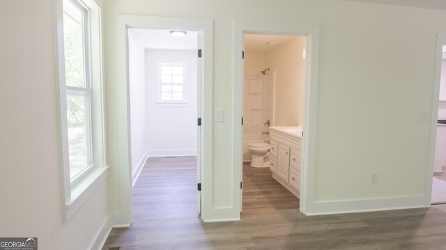 71 Cold Springs Rd, Warm Springs, GA 31830 - corridor featuring dark wood-style flooring and baseboards