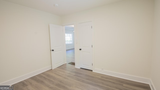 71 Cold Springs Rd, Warm Springs, GA 31830 - empty room featuring wood finished floors, baseboards, and a smoke detector