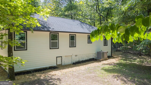 71 Cold Springs Rd, Warm Springs, GA 31830 - view of home's exterior with cooling unit and a shingled roof