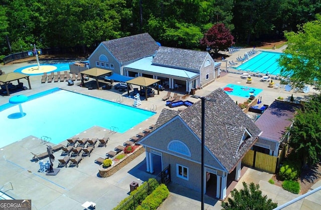 222 Mossy Pl, Alpharetta, GA 30005 - community pool with a patio