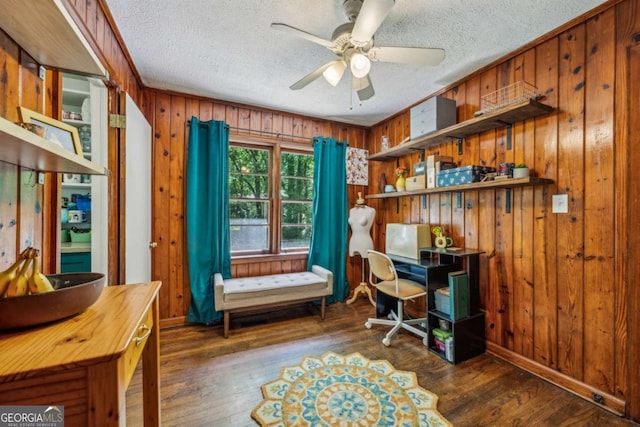 1410 Cobb Branch Dr, Decatur, GA 30032 - office featuring wooden walls, hardwood / wood-style floors, a ceiling fan, and a textured ceiling