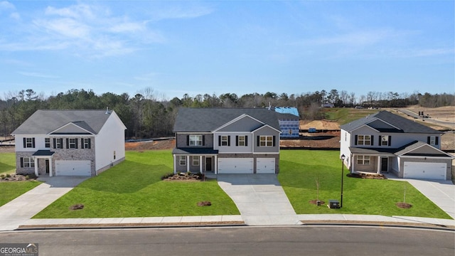 712 Curb Ct, Locust Grove, GA 30248 - view of front facade with driveway, a front yard, and a garage