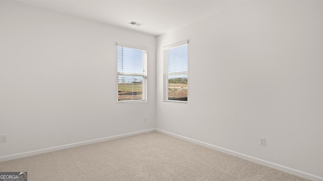 712 Curb Ct, Locust Grove, GA 30248 - carpeted empty room featuring baseboards