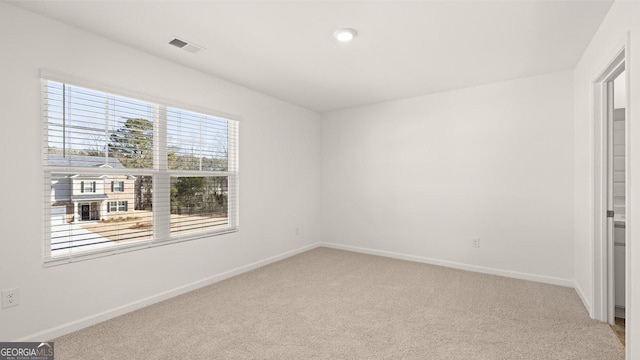 712 Curb Ct, Locust Grove, GA 30248 - unfurnished bedroom with light colored carpet and baseboards